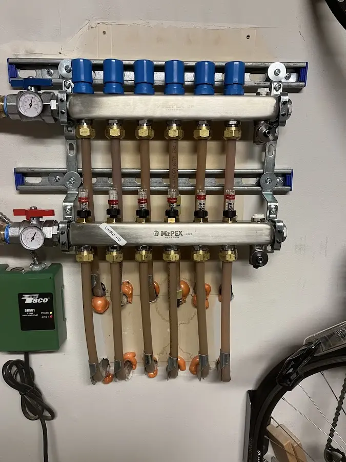 Plumber performing Water Heater Repair at a residential property in Show Low